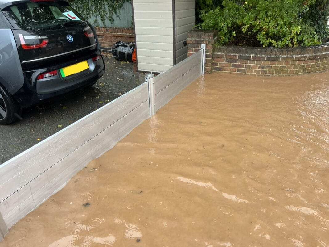 Custom aluminum flood barrier for residential garage door in Florida USA
