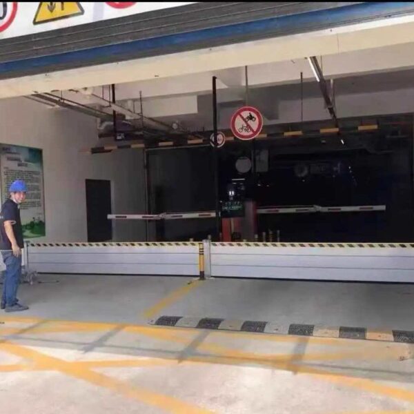 Aluminum flood barriers installed across an underground parking entrance in Clearwater Florida