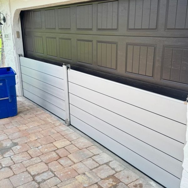 Custom aluminum flood barrier for garage opening in Florida USA
