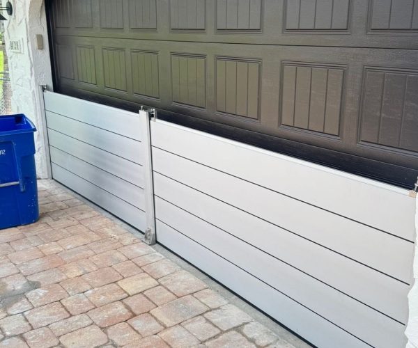 Custom aluminum flood barrier for garage opening in Florida USA