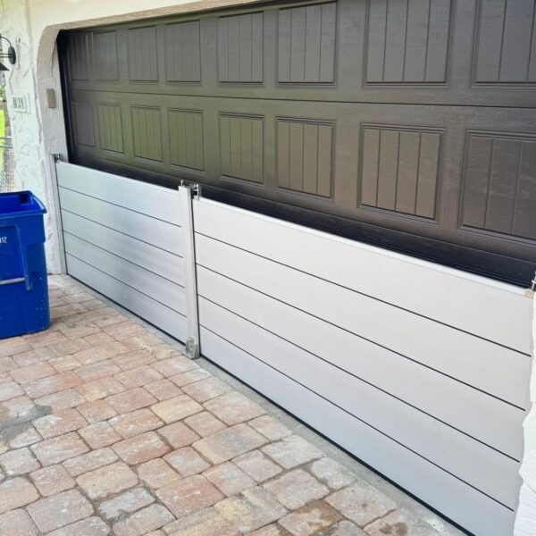 Custom aluminum flood barrier for garage opening in Florida USA